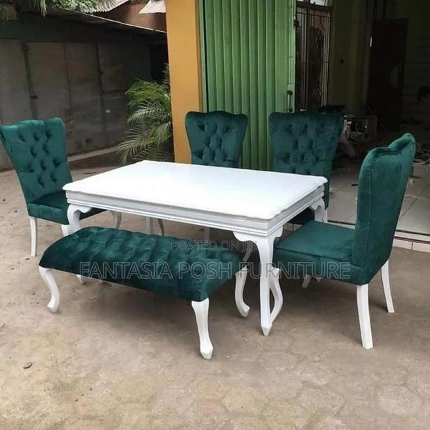 White Dining Table With Green Velvet Tufted Chairs and Bench - main view