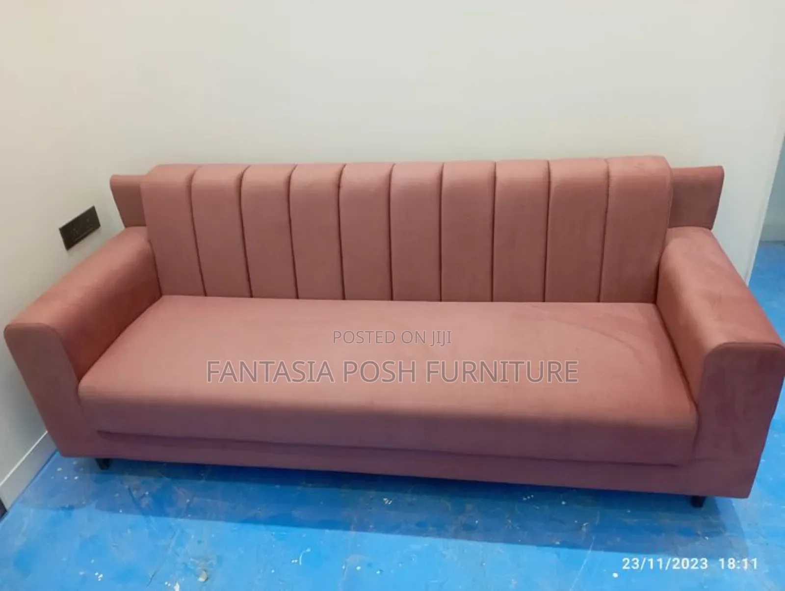 Pink Velvet Three Seater Sofa With Channel Tufted Back
