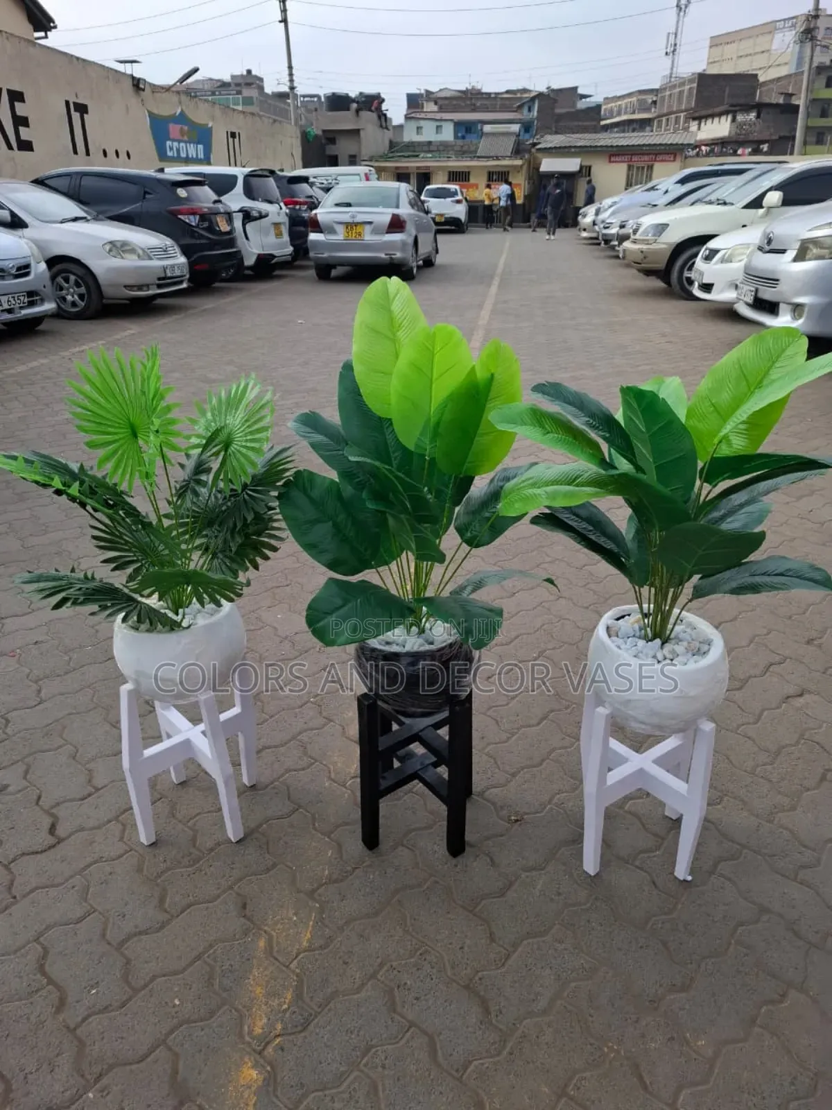 Stand With Beautiful Flowers and Vases