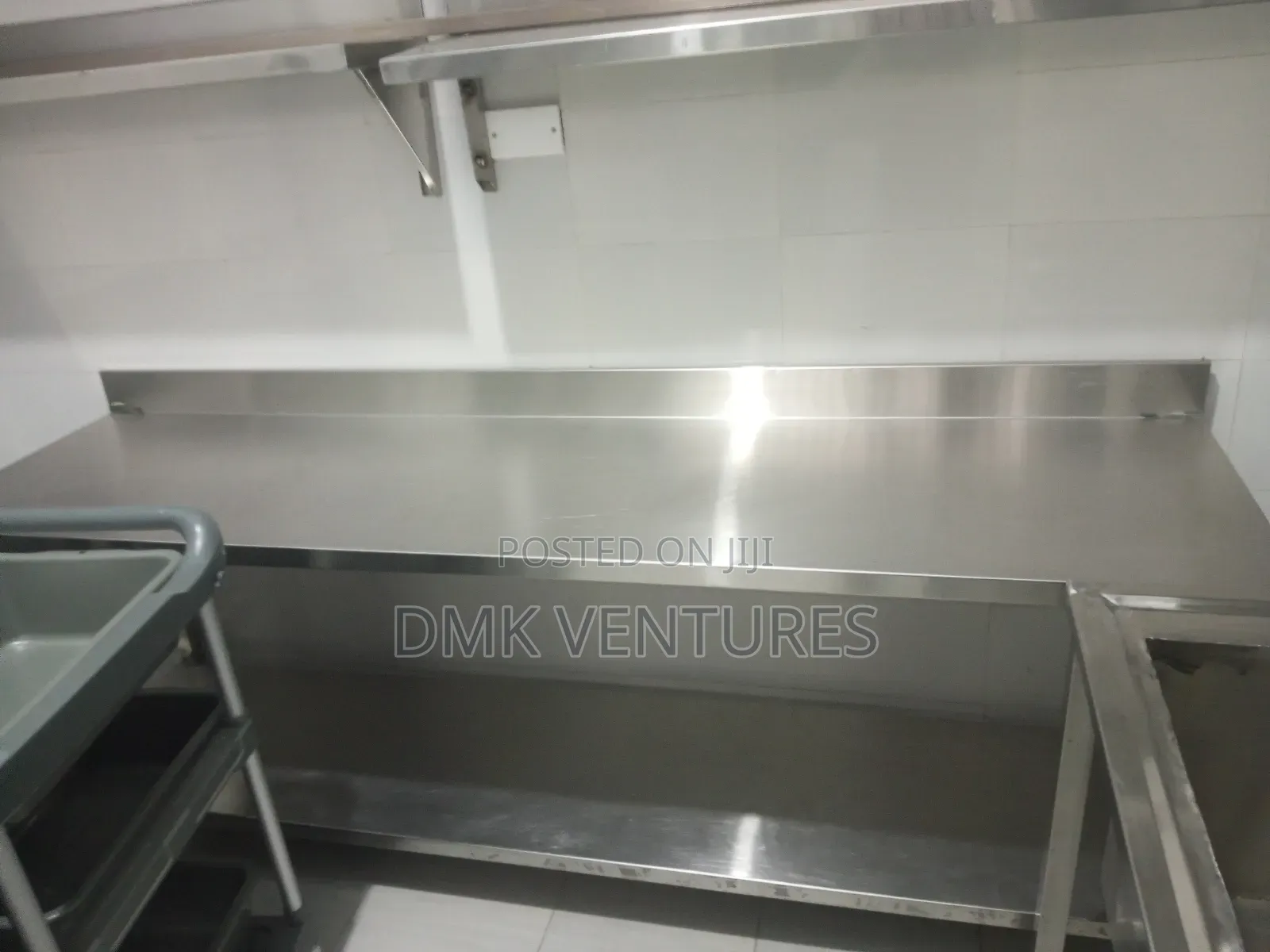 Shiny Stainless Institutional Working Table Available