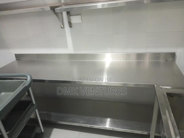 Shiny Stainless Institutional Working Table Available