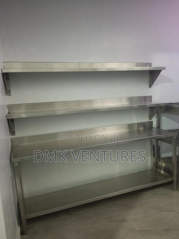 Complete Kitchen Working Area With Working Table and Storage Shelves - main view