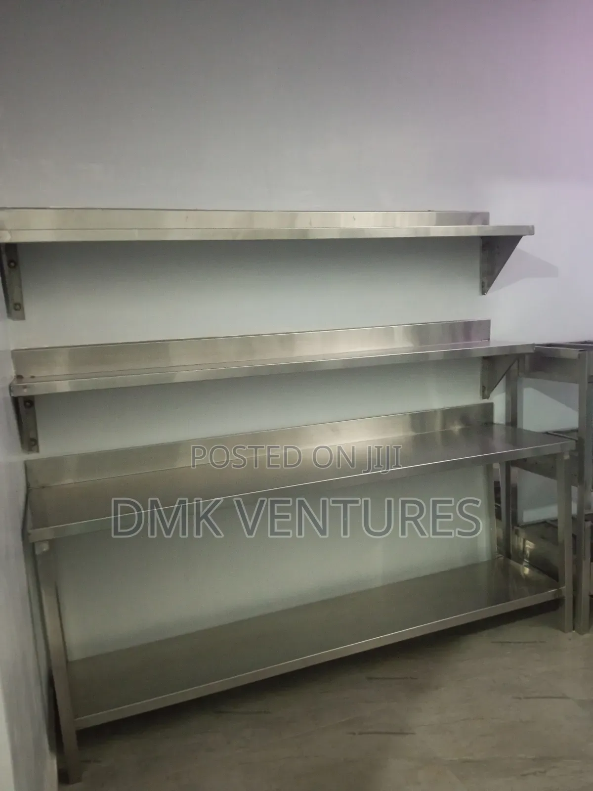 Stylish Kitchen Storage Shelves and a Working Table Top , Stainless