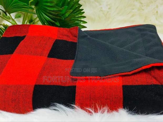 Maasai Red Shuka Black Fleece Blanket. - main view