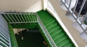 Evergreen Artificial Grass for a Modern Outdoor Stairs Look