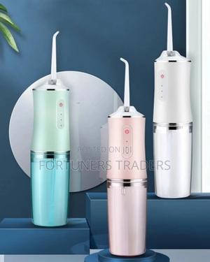 Oral Irrigator With 4 Nozzle Tips - thumbnail 2
