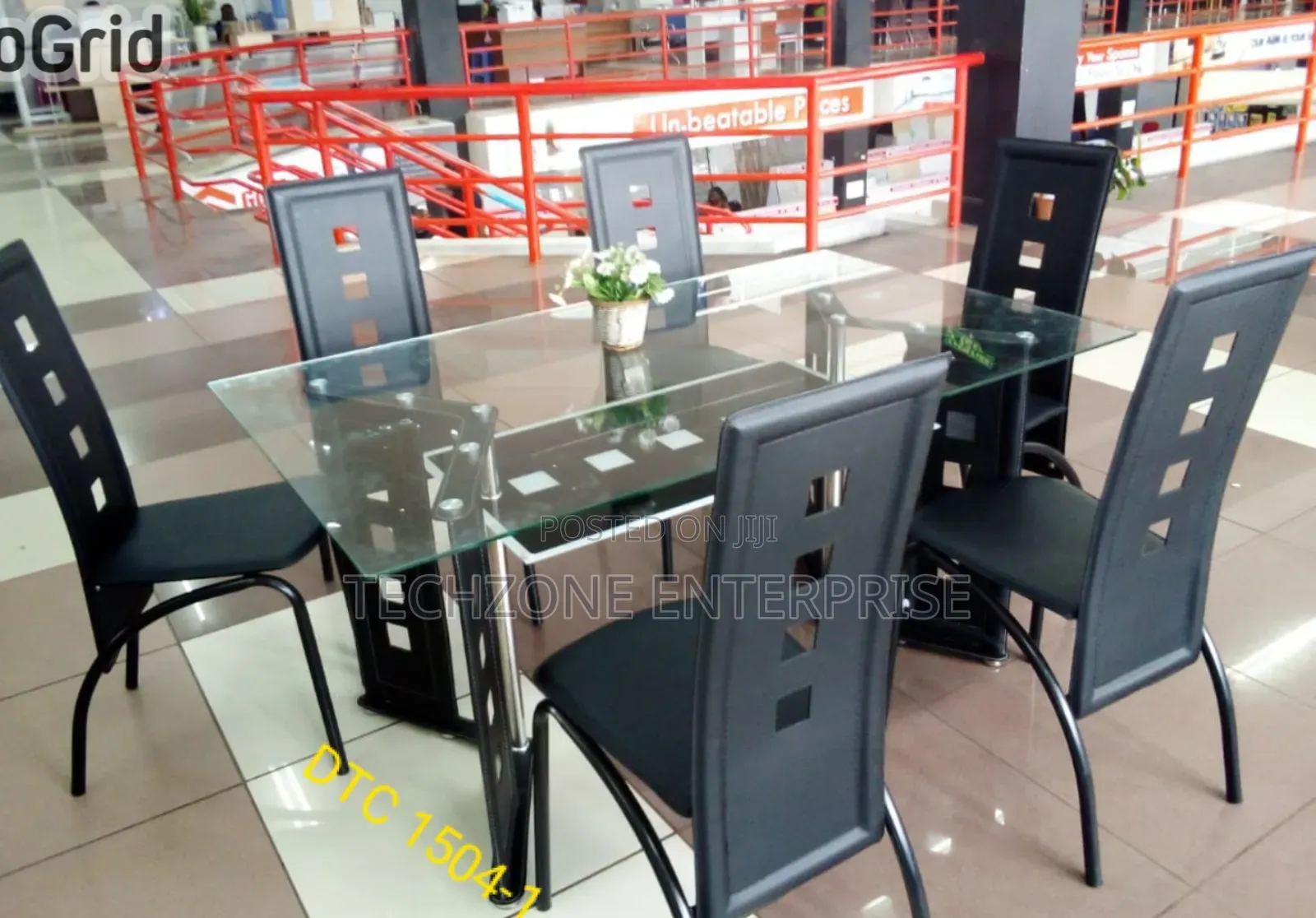 Quality 6 Seater Glass Dining Table With Metallic, Leather Seat 