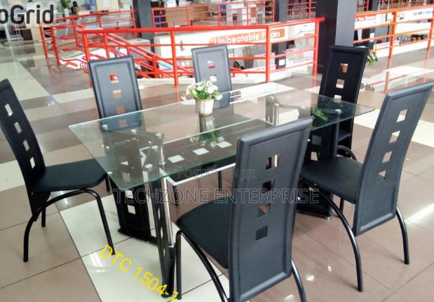 Quality 6 Seater Glass Dining Table With Metallic, Leather Seat 