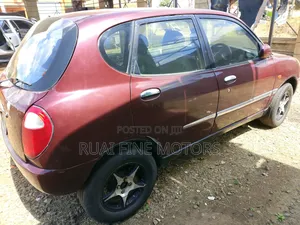 Toyota Duet 2002 Maroon