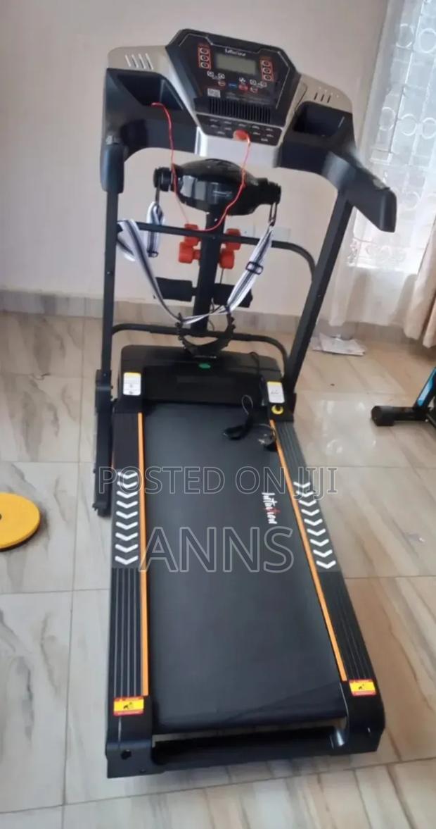 *Auto Incline Treadmill With Massage Belt and Free Dumbells.
