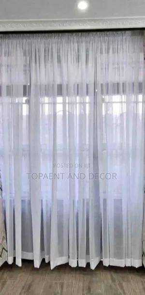 Decorative White Sheer Curtain With Stylish Finials
