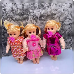 White Doll With Pacifier and Produce Sounds