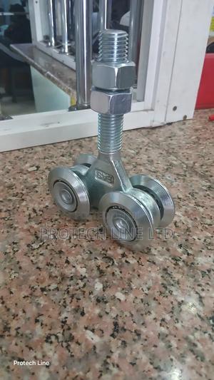 Overhead Hanging Door Rollers - thumbnail 2