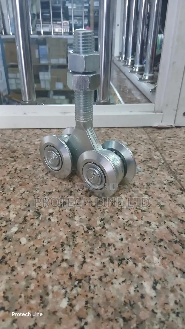 Overhead Hanging Door Rollers - thumbnail 3