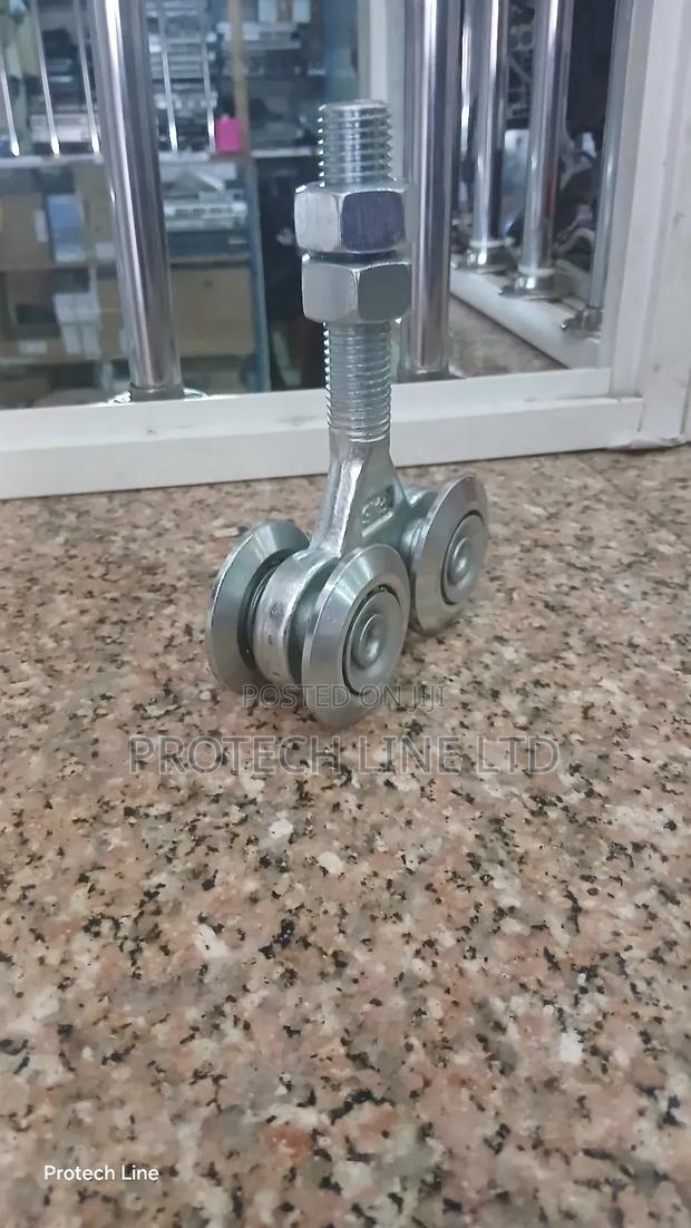 Overhead Hanging Door Rollers - thumbnail 4