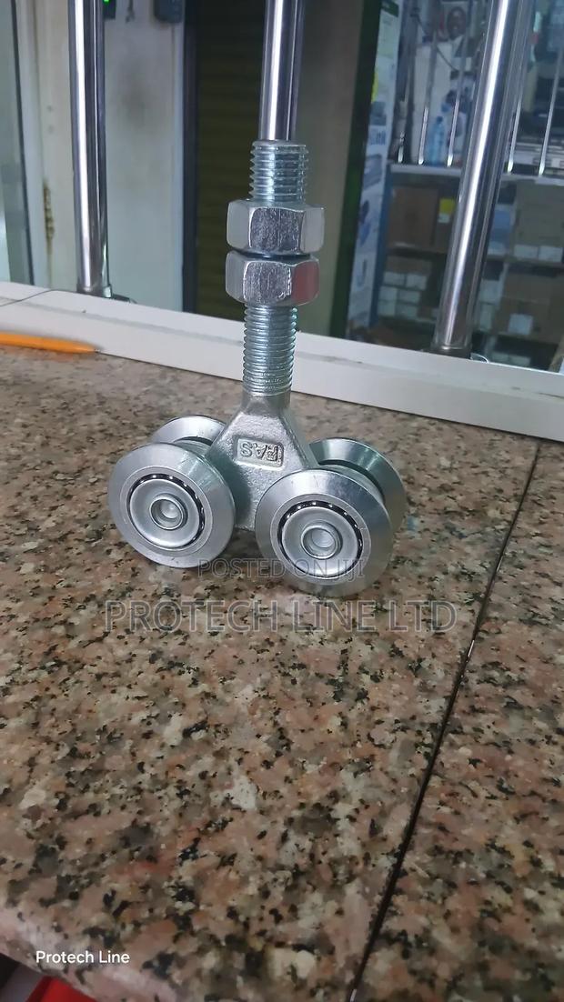 Overhead Hanging Door Rollers - thumbnail 5