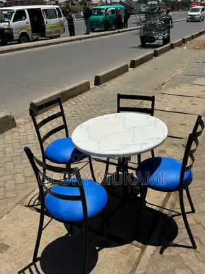 White Marble Table And Chairs