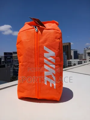 New Orange Nike Boots/Essentials Bag