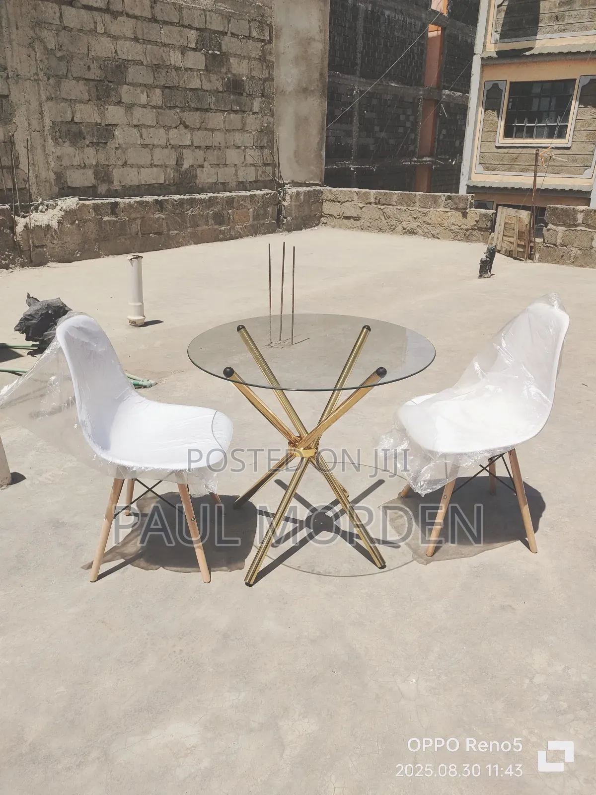 White Eames Chair With Glass Table