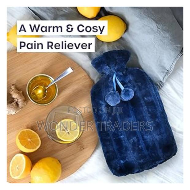 *Fluffy Fabric Covered 2 Litre Hot Water Bottle Bag*
.