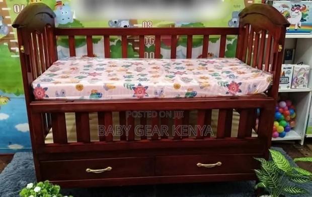 Mahogany Baby Cot + Quality Mattress – Comfort Assured”