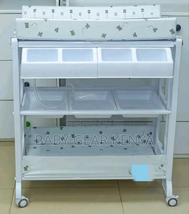 Comfort-Height Baby Bath Station With Accessory Shelves