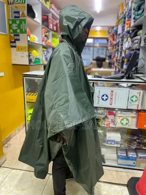  Ponchos on Green Juggle and Press Button Closure