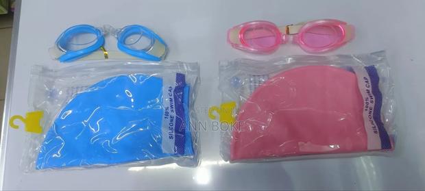 Two in 1 Silicon Swimming Cape and Anti Fog Swimming Glasses.