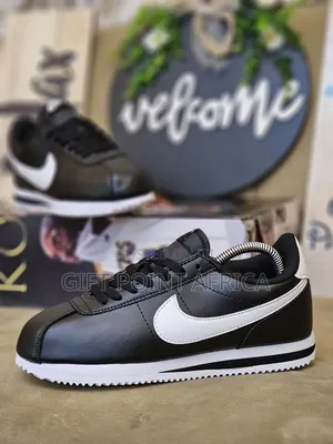 White Nike Cortez Sneakers
