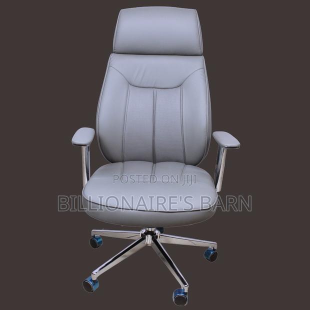 Grey Leather Office Chair, Sleek High Back With Chrome Finish.