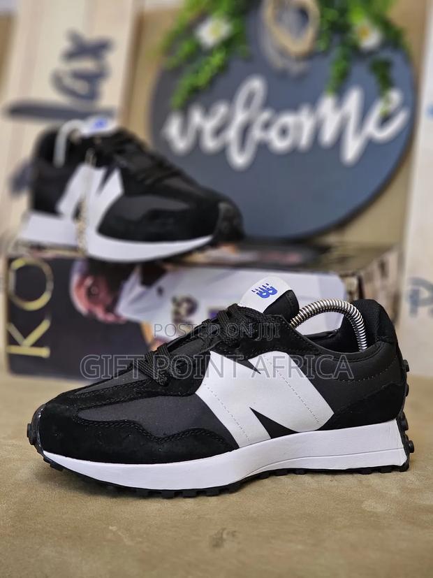 Black New Balance 327 Sneakers