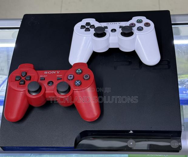 Gently Used Playstation 3 +2 Pads+ 12 Games