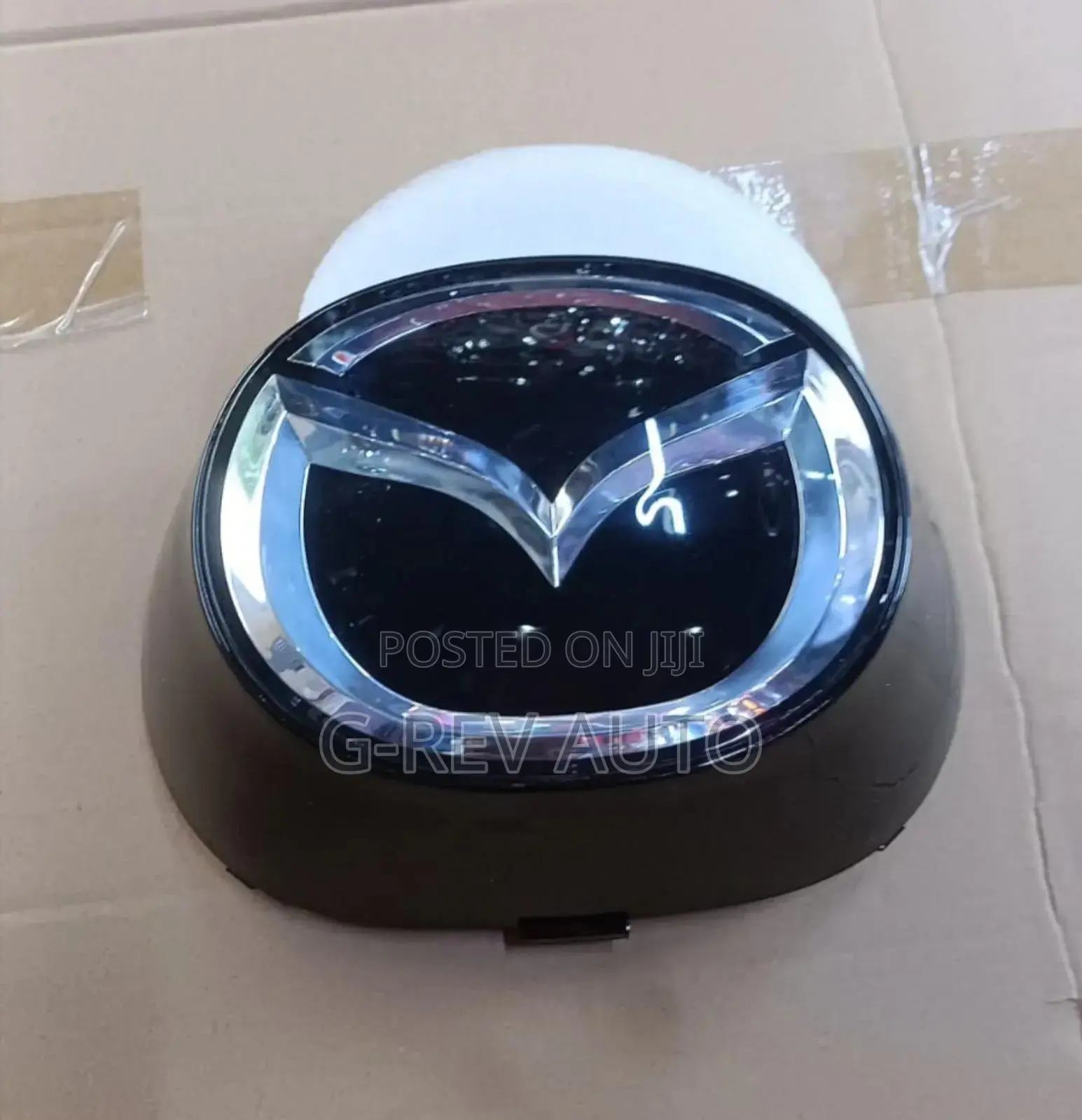 Cx5 2017 2018 Glass Grill Logo.