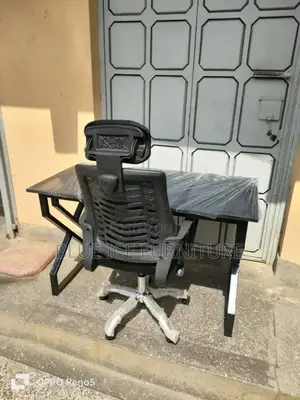 All Black Table and Headrest Chair