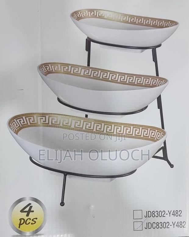 Aset of 3 Ceramic Fruit Plates on Black Metal Rack