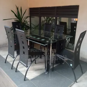 Executive 6 Sitter Glass Dinning Table  With Leather Seat
