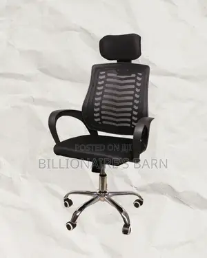 Secretarial_mesh_chair__adjustable_headrest_and_lumbar_support