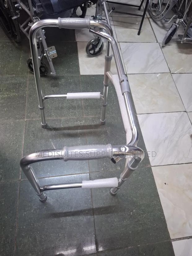 Foldable  Walking  Frame . Height Adjustable.