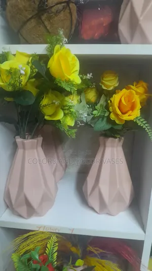Yellow Roses on Pink Hard Plastic Vase