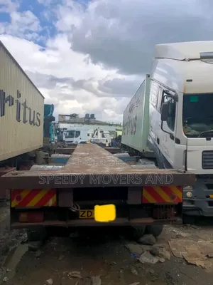 Highsided, Flatbed Trailers Available for Load Delivery