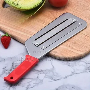 Stainless Steel Vegetable Shredder Equipped With a Red Plastic,