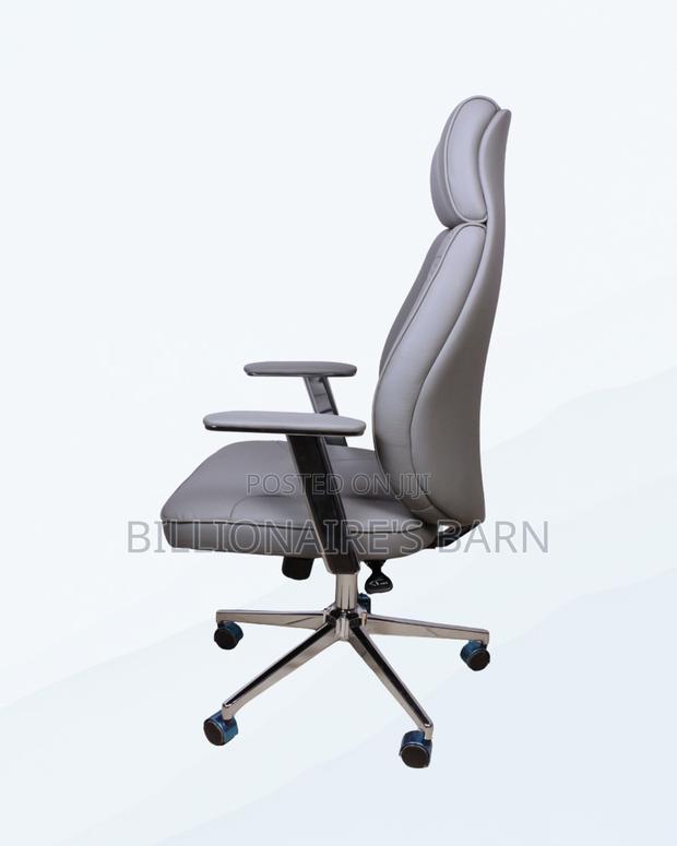 Sleek Grey Executive Leather Office Chair — Smooth-Rolling Mobility