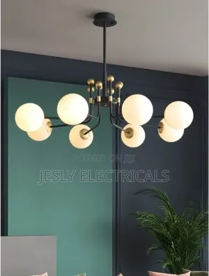 Modern Chandelier With Multiple Spherical, Opaque White Shades, Gold.