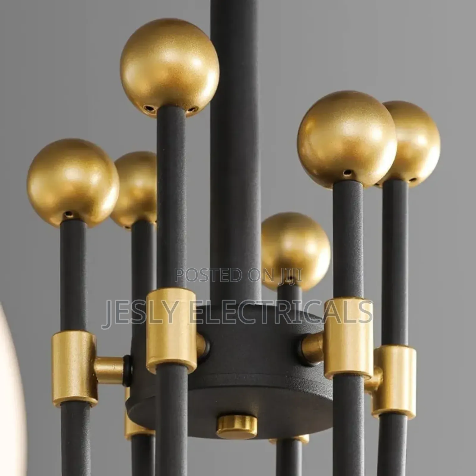 Modern Chandelier With Multiple Spherical, Opaque White Shades, Gold.