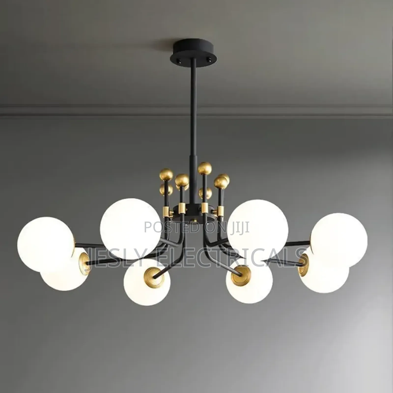 Modern Chandelier With Multiple Spherical, Opaque White Shades, Gold.