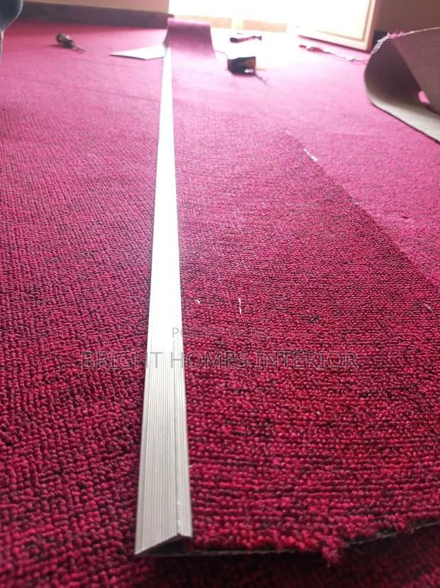 Maroon Wall to Wall Carpet Available