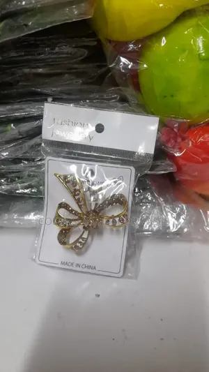 Variety of Gold Rusty Brooches