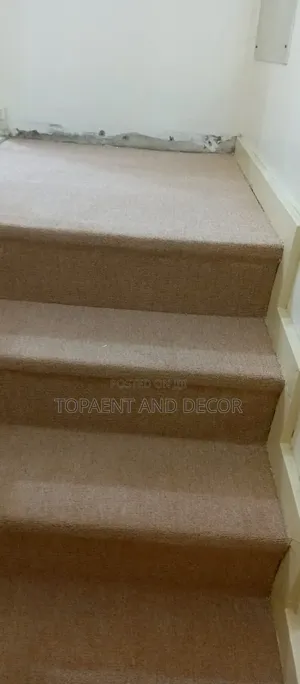 Stylish Stairs With Wall to Wall Designed Carpet
