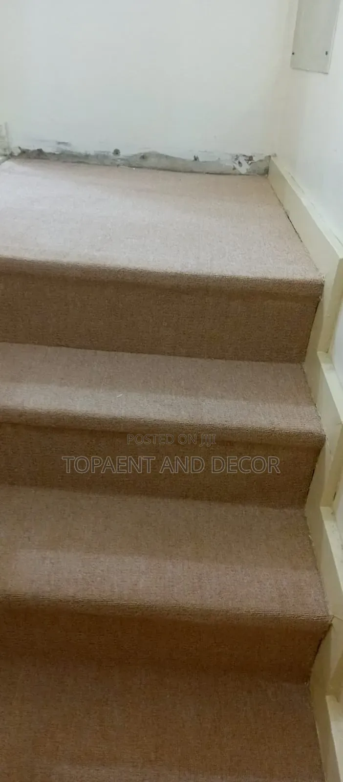 Stylish Stairs With Wall to Wall Designed Carpet