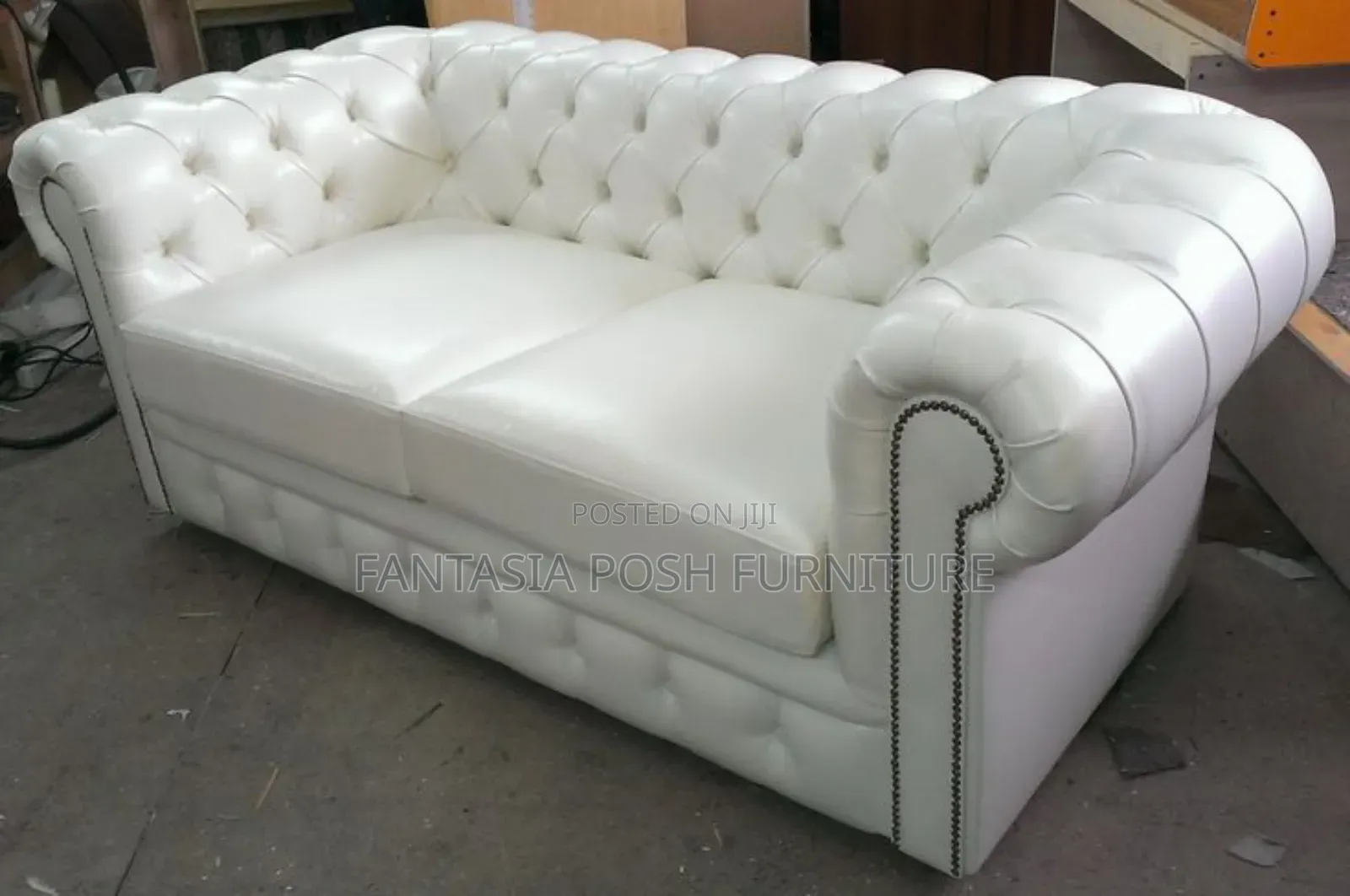 White Chesterfield Two Seater Loveseat With Button Tufting